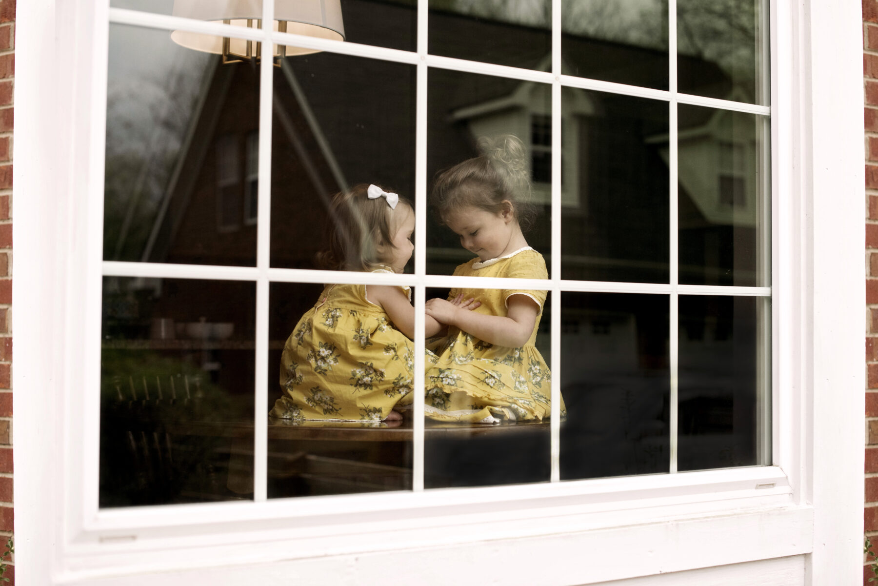 Through the window family photoshoot by Elaine Drabik Photography featured on Nashville Bride Guide