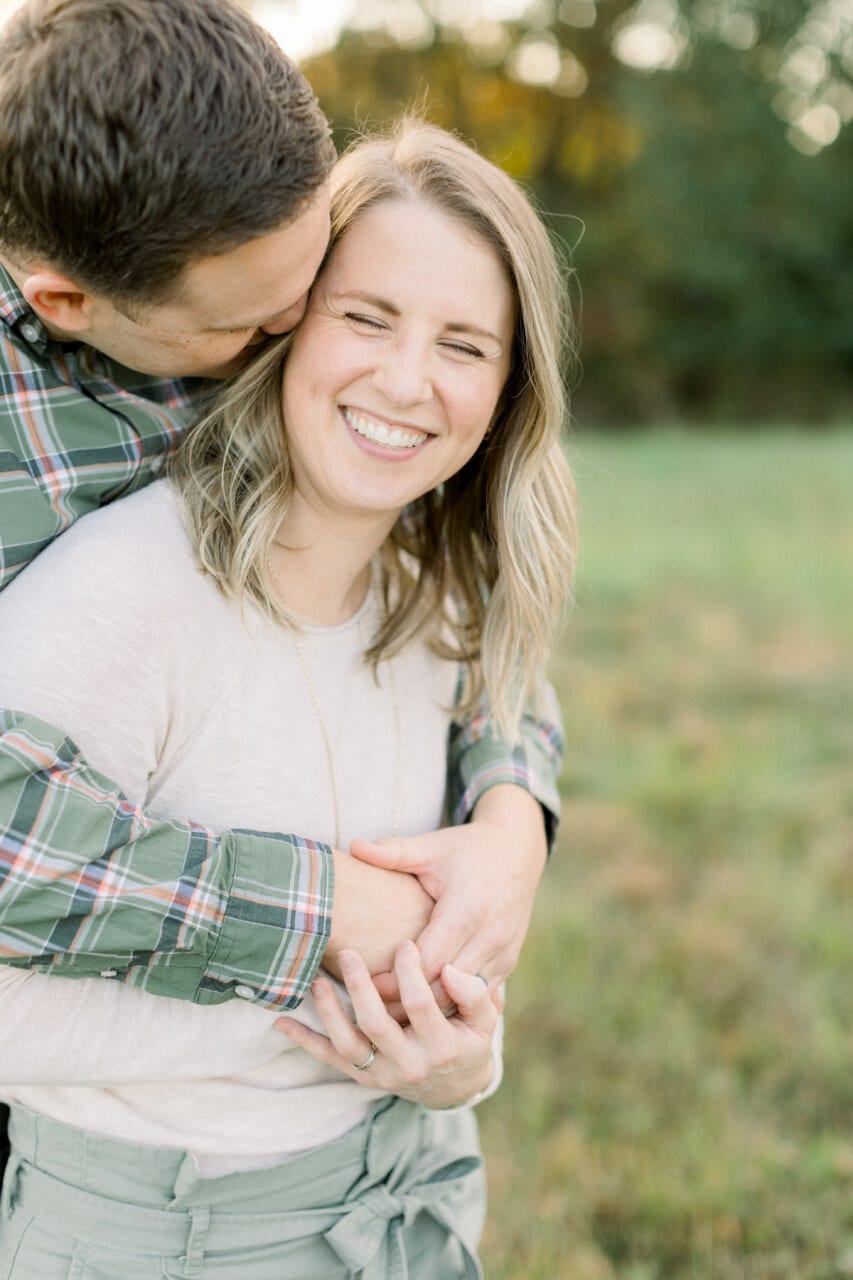 Mom and dad hugging and laughing from j. photography featured on Nashville Bride Guide