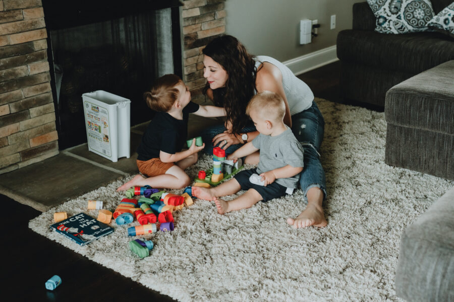 Mom playing blocks with her boys | Nashville Baby Guide