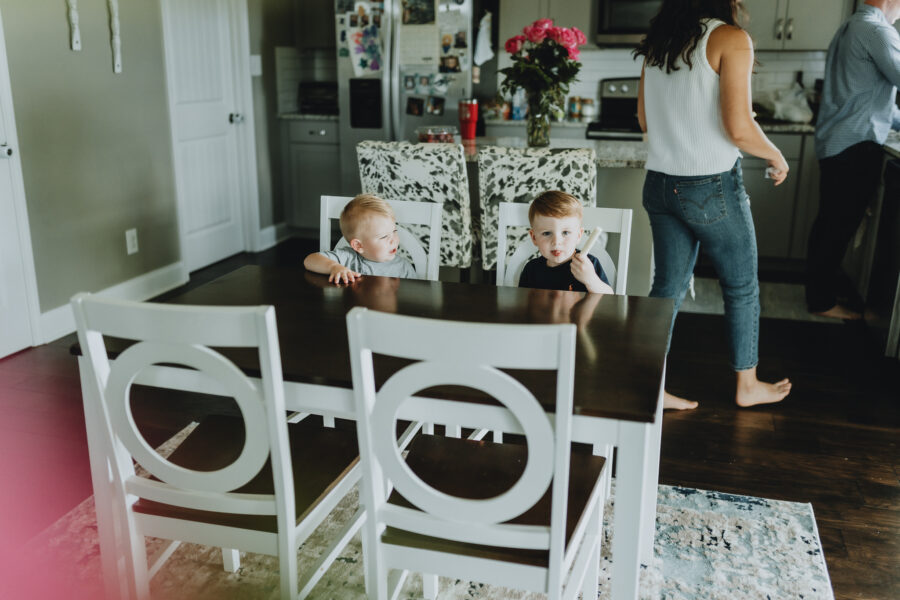 Boys sitting at kitchen table | Nashville Baby Guide